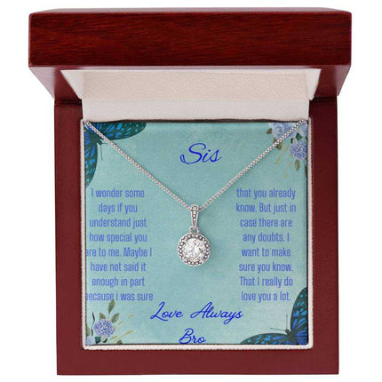 Eternal Hope Necklace on a To Sis from Bro greeting card in a mahogany box on a white background up close