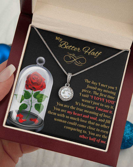 eternal hope necklace in a luxury box in a model's hand