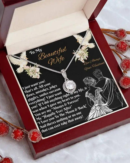 white gold eternal hope necklace in a mahogany box angled left