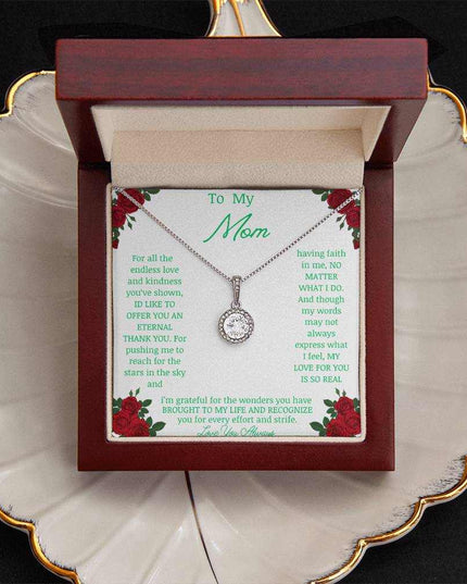 Eternal Hope Necklace with a white gold pendant in a mahogany box angle 2