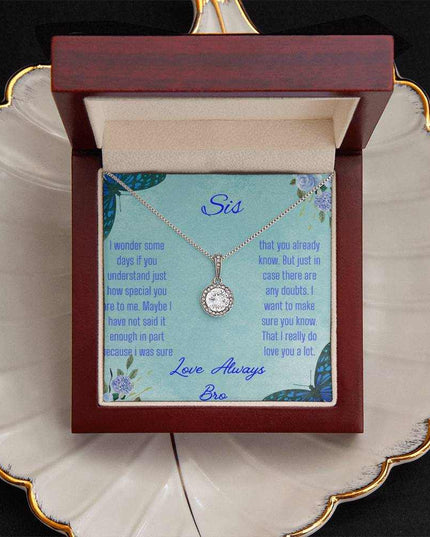 Eternal Hope Necklace on a To Sis from Bro greeting card in a mahogany box on a white coffee filter