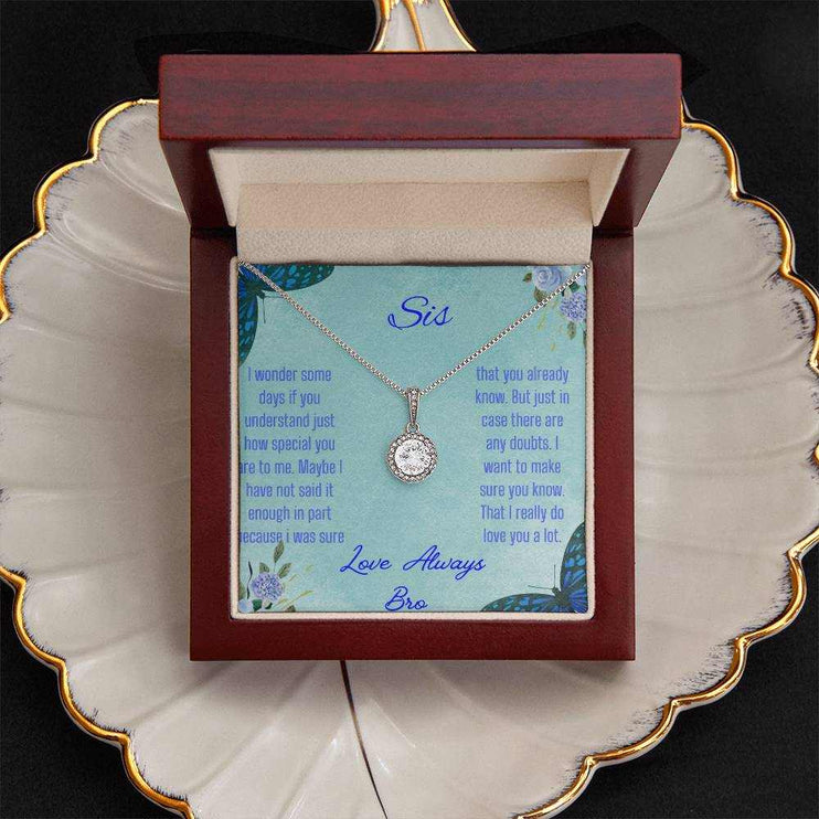 Eternal Hope Necklace on a To Sis from Bro greeting card in a mahogany box on a white coffee filter