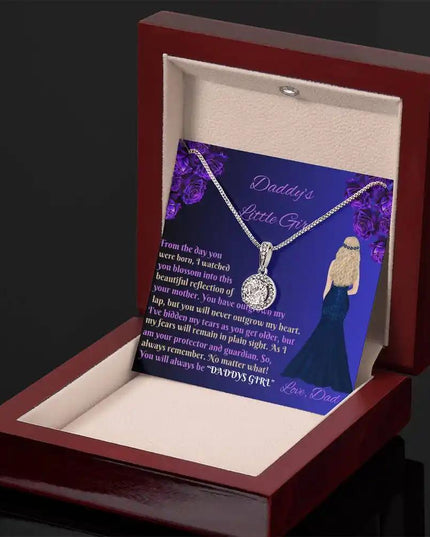 white gold eternal hope necklace in a mahogany box angled to right