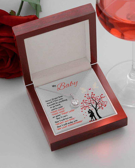 eternal hope necklace in a luxury box with greeting card angled left