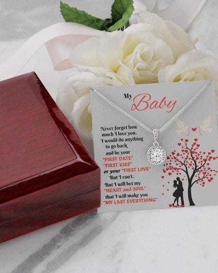 eternal hope necklace on a message card beside a closed luxury box