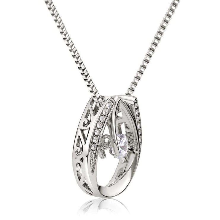 lucky in love necklace up close of charm sideways angle