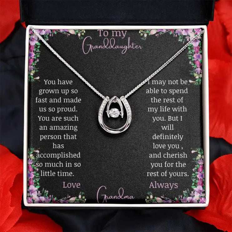 Lucky In Love Necklace with a white gold charm with a to granddaughter from grandma greeting card close up