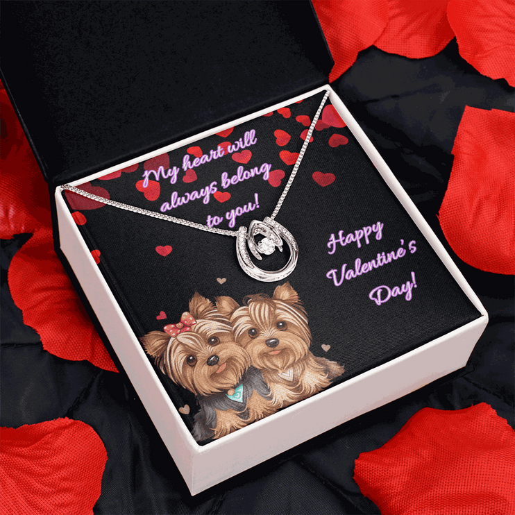 lucky in love necklace in a soft box angled to the right