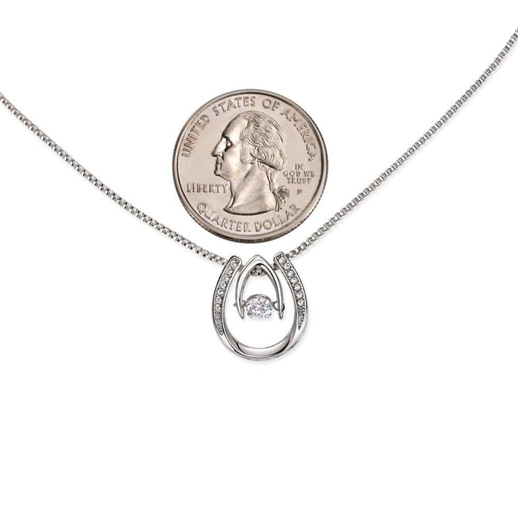 lucky in love necklace comparing charm size to a quarter