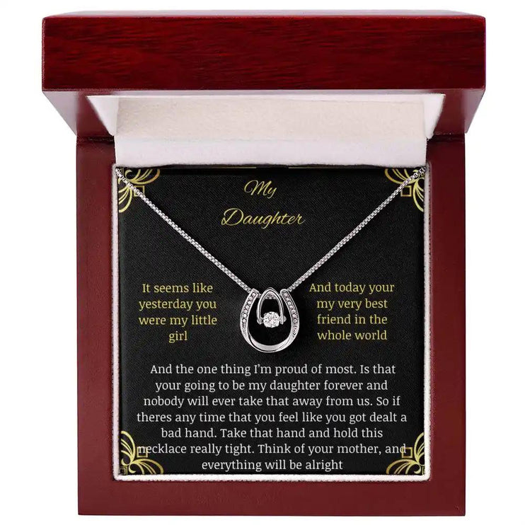 lucky in love necklace with a white gold pendant in a mahogany box angle 1