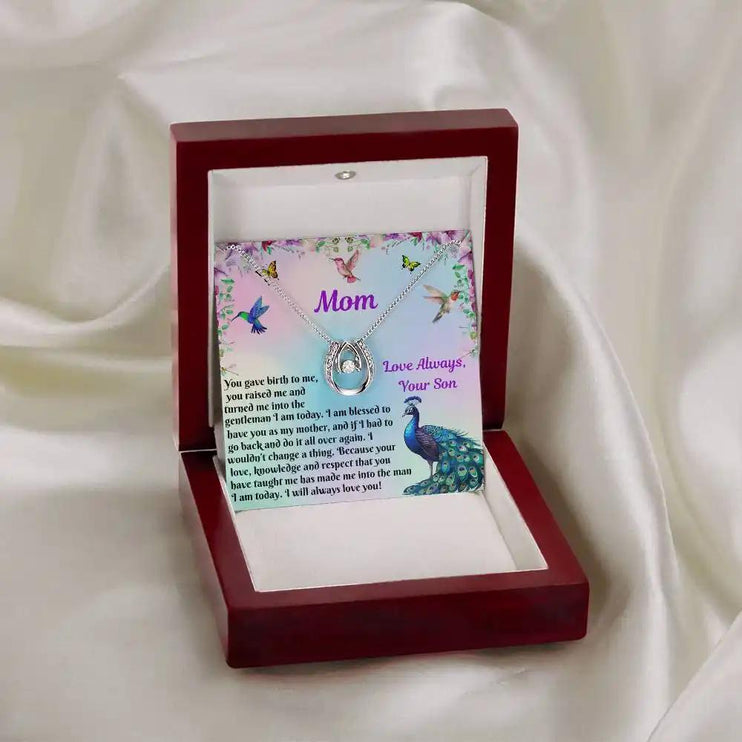 Lucky In Love Necklace in mahogany box angled right