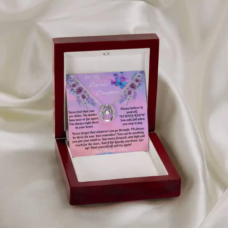 white gold lucky in love necklace in mahogany box on white cloth