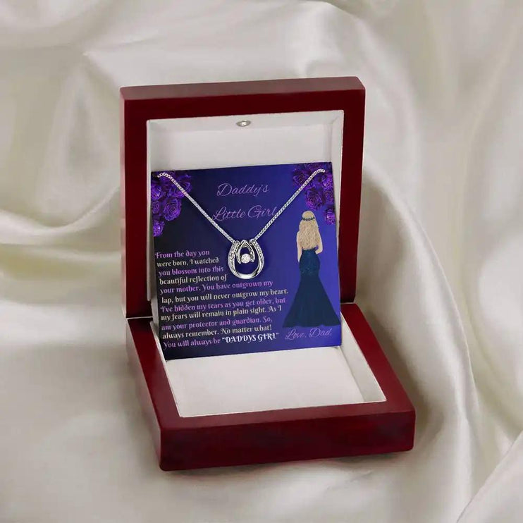 white gold lucky in love necklace in mahogany box on white cloth