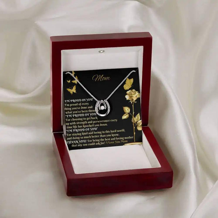 lucky in love necklace in mahogany box