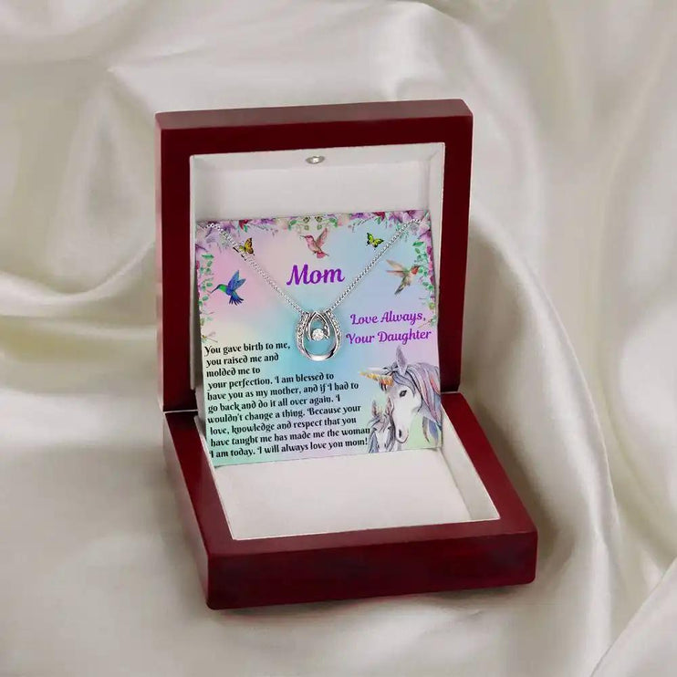 lucky in love necklace in a mahogany box