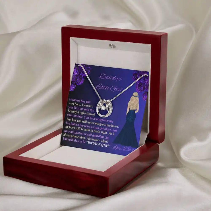 white gold lucky in love necklace in mahogany box angled right