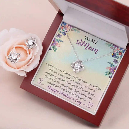 Love Knot Necklace with Love Knot Earring Set in a mahogany box side angle