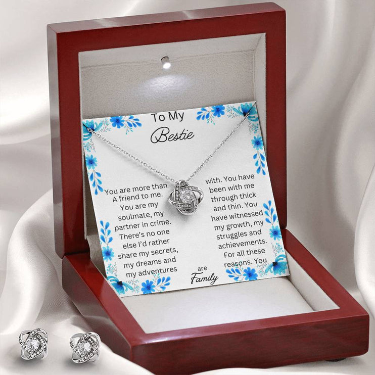 Love Knot Necklace Love Knot Earring Set with a white gold pendant and in a mahogany box angle 2