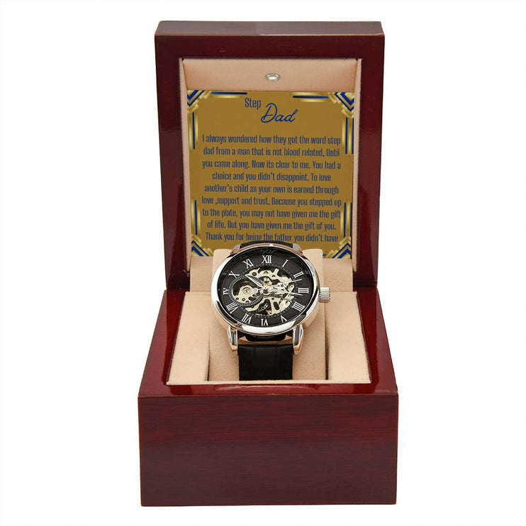 a men's openwork watch in a mahogany box with to stepdad greeting.