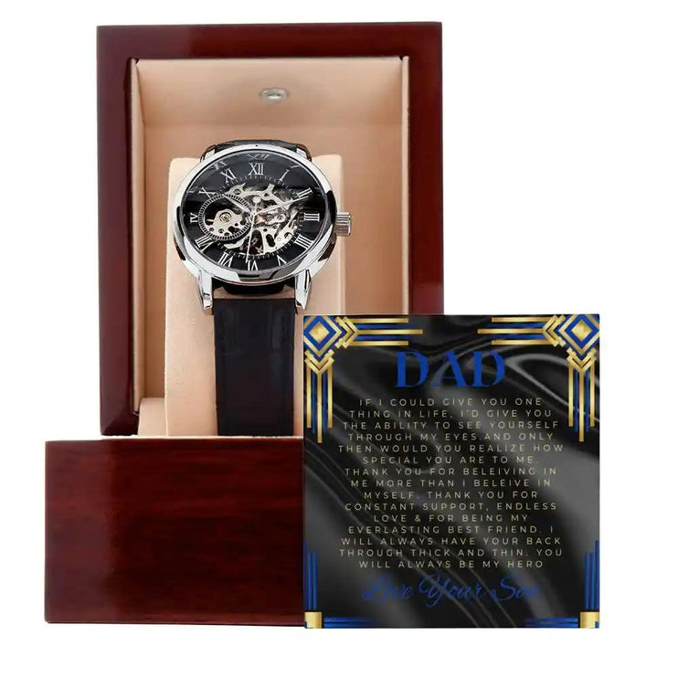 Men's Openwork Watch with to dad greeting card leaning on the mahogany box