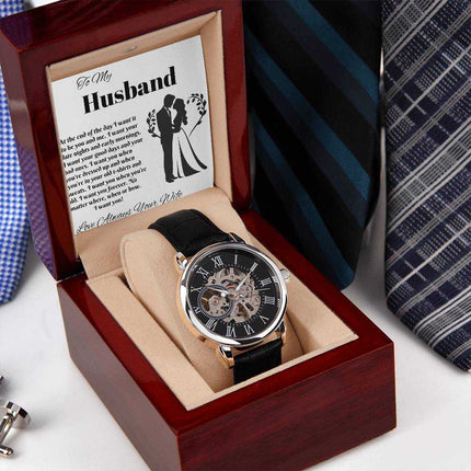 openwork watch in a mahogany box with greeting card in box