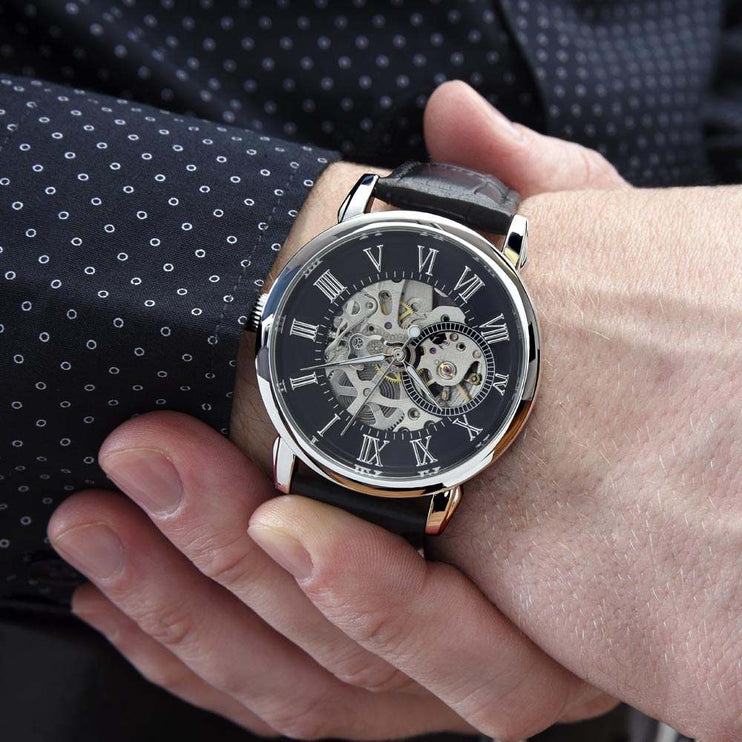openwork watch on a model's wrist