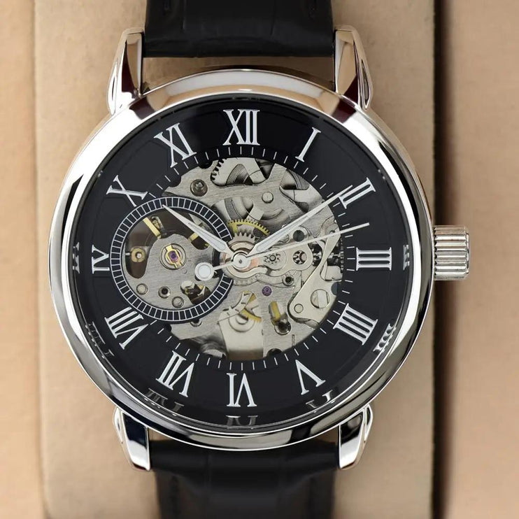 mens openwork watch up close of face