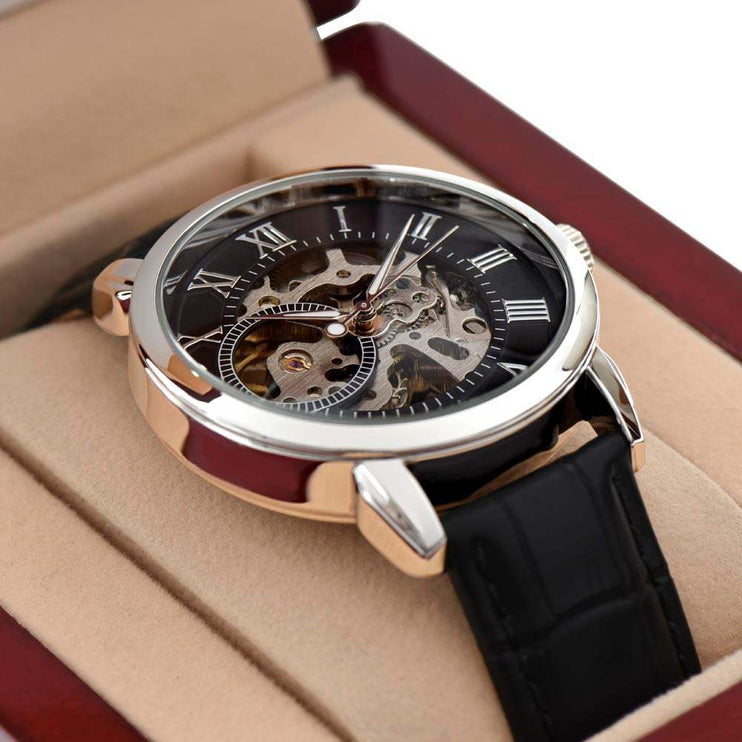 openwork watch in a mahogany gift box up close of watch