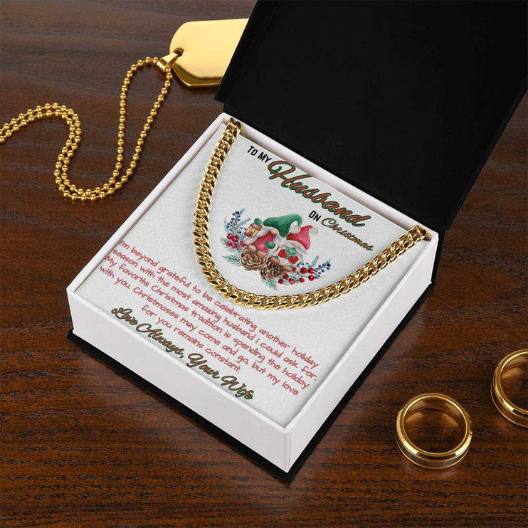 yellow gold Cuban link chain in soft box angled to right