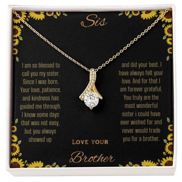 Alluring Beauty Necklace with a yellow gold variant on a To Sis from Brother greeting card with a close up view
