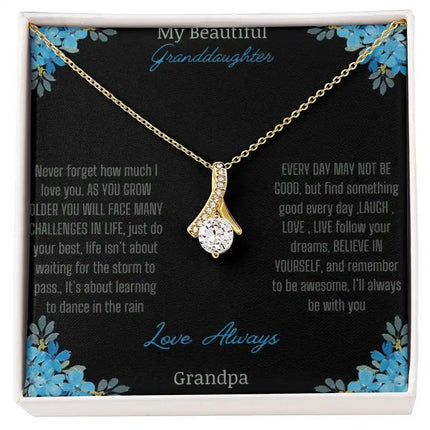 Alluring Beauty Necklace with a yellow gold charm with a to granddaughter from grandpa greeting card up close