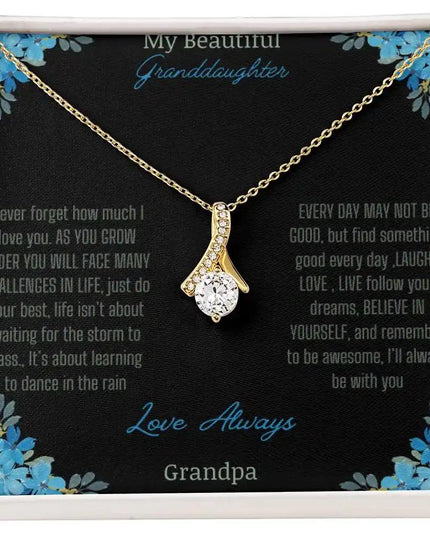 Alluring Beauty Necklace with a yellow gold charm with a to granddaughter from grandpa greeting card up close