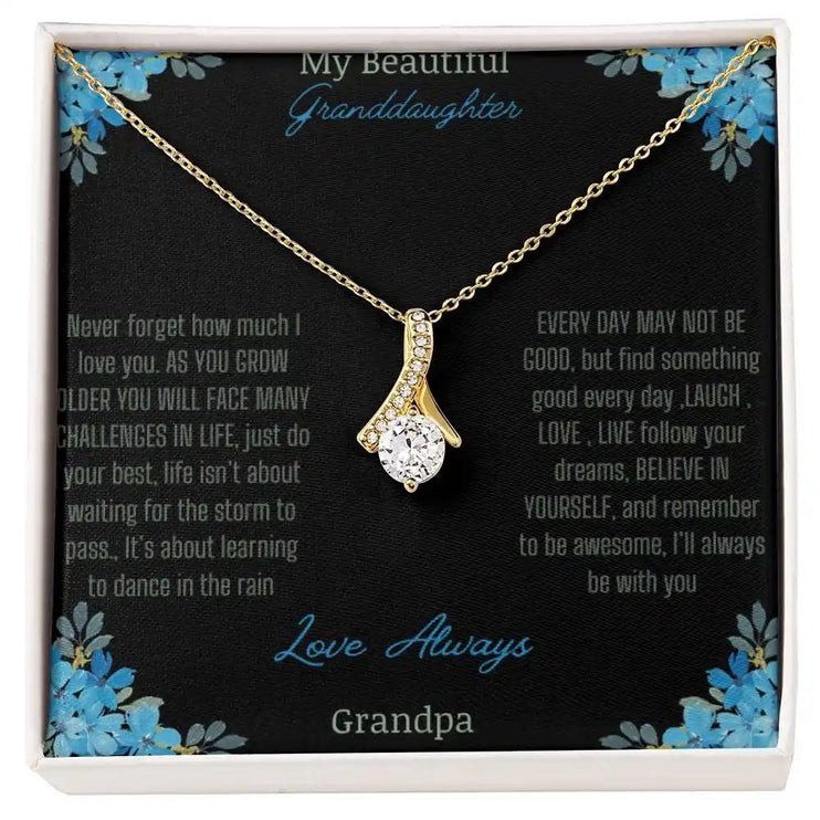 Alluring Beauty Necklace with a yellow gold charm with a to granddaughter from grandpa greeting card up close