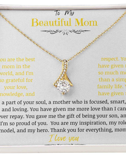 A yellow gold Alluring Beauty Necklace up close.
