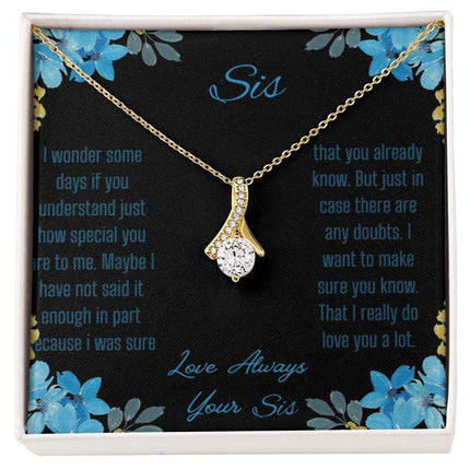 Alluring Beauty Necklace with a yellow gold variant on a to sis from sis greeting card with a close up view.