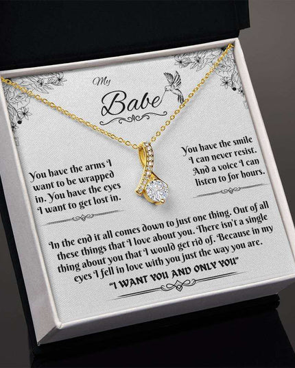 yellow gold alluring beauty necklace in a soft box angled to the left