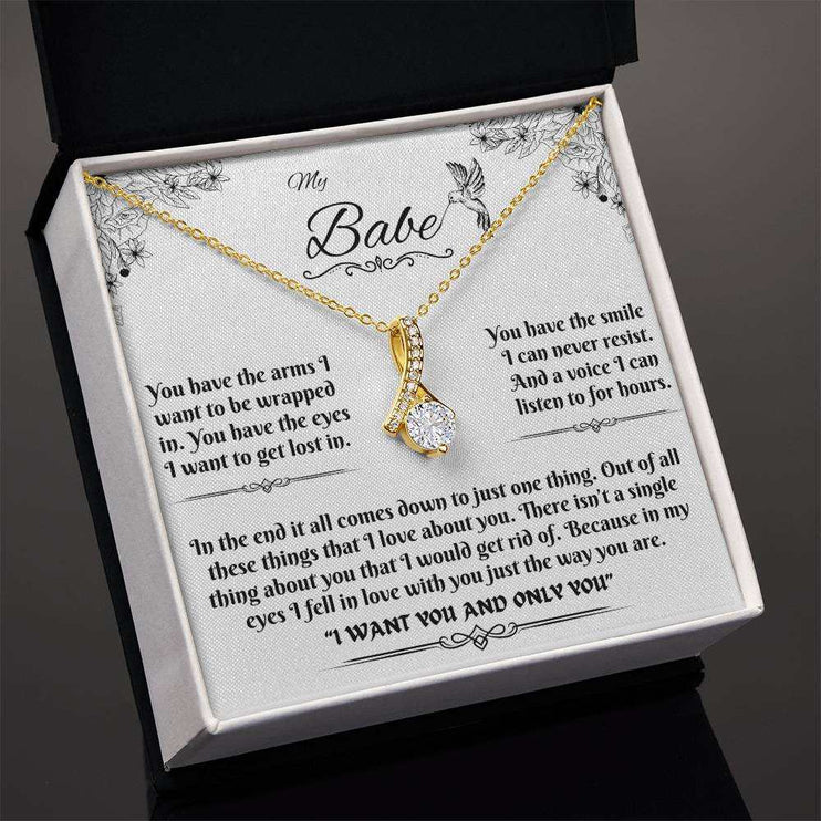 yellow gold alluring beauty necklace in a soft box angled to the left