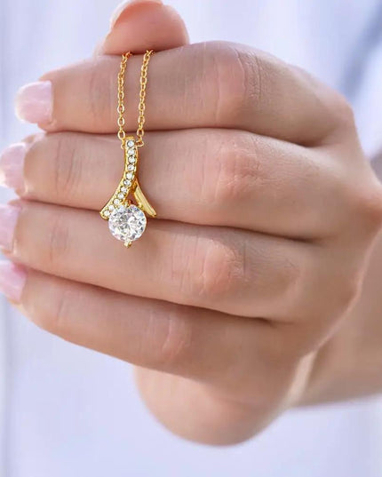 yellow gold alluring beauty necklace in models' hand