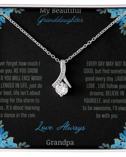 Alluring Beauty Necklace with a white gold charm with a to granddaughter from grandpa greeting card up close