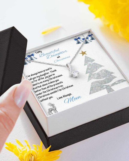 white gold alluring beauty necklace in a soft box with lid in model's hand