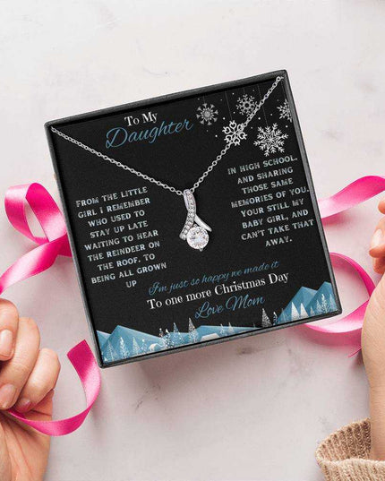 white gold alluring beauty necklace in soft box being wrapped with bow
