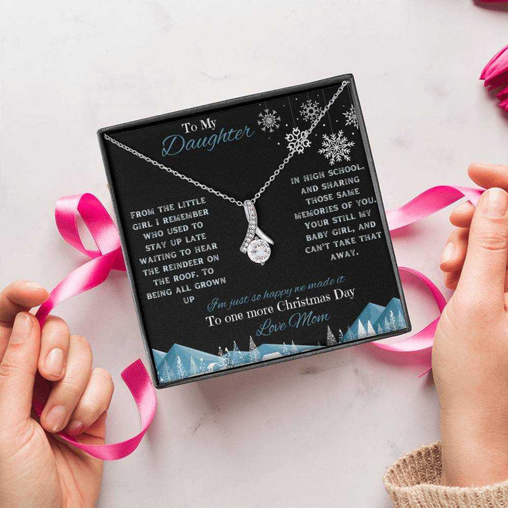 white gold alluring beauty necklace in soft box being wrapped with bow