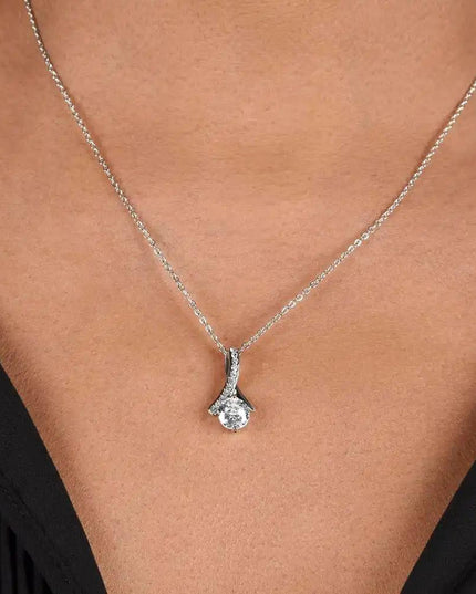 white gold alluring beauty necklace on model's neck