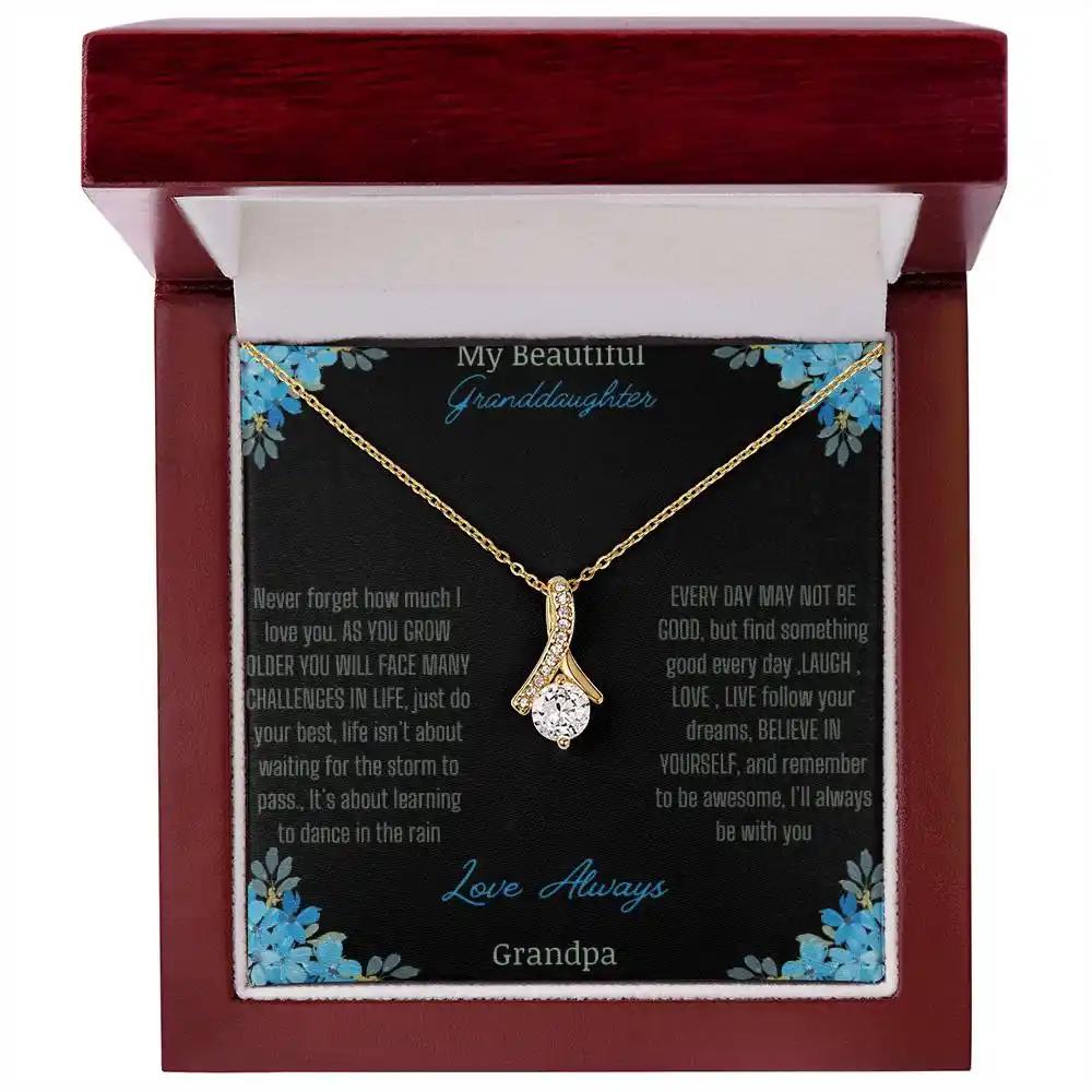 Alluring Beauty Necklace with a yellow gold charm with a to granddaughter from grandpa greeting card up close