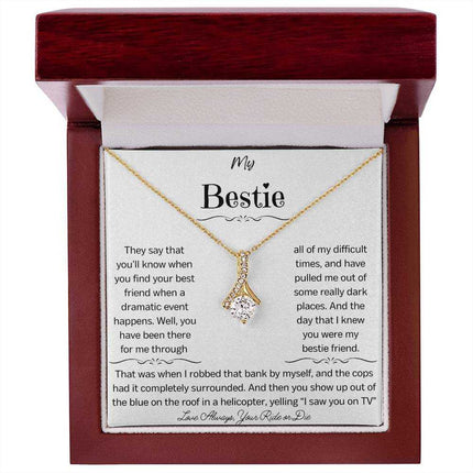 a yellow gold alluring beauty necklace in a mahogany box