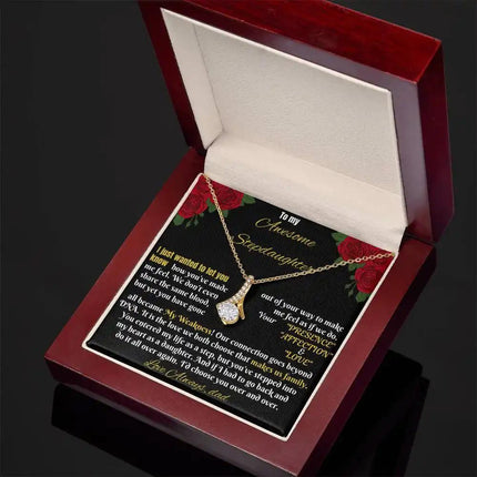 yellow gold alluring beauty necklace in a mahogany box angled right