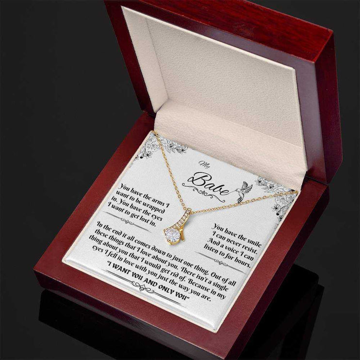 yellow gold alluring beauty necklace in a luxury box angled to the left