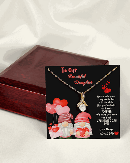 yellow gold alluring beauty necklace on a message card outside a luxury box