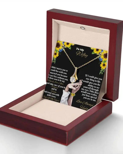 yellow gold alluring beauty necklace in mahogany box angled left