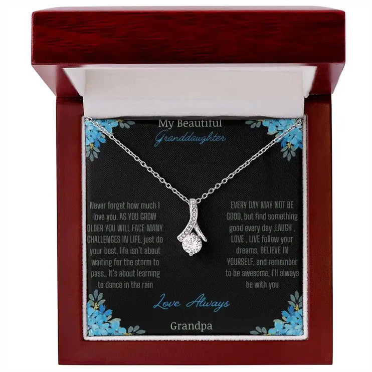 Alluring Beauty Necklace with a white gold charm with a to granddaughter from grandpa greeting card in a mahogany box